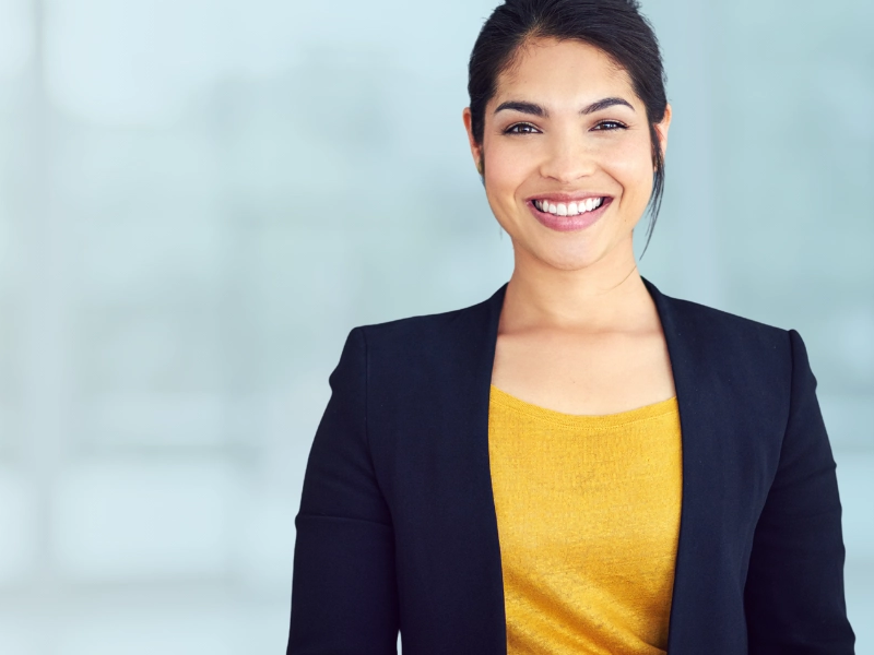 woman cheering at her desk